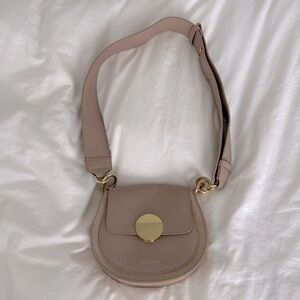 Small Crossbody Saddle Bag in Blush Pink by (Unknown)